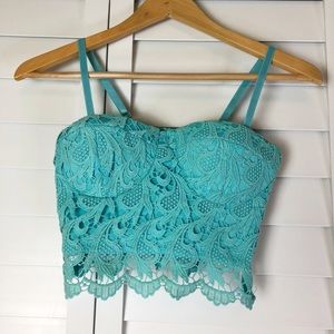 Green bustier, corset, lace. Turquoise